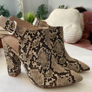 Open back stacked heel bootie